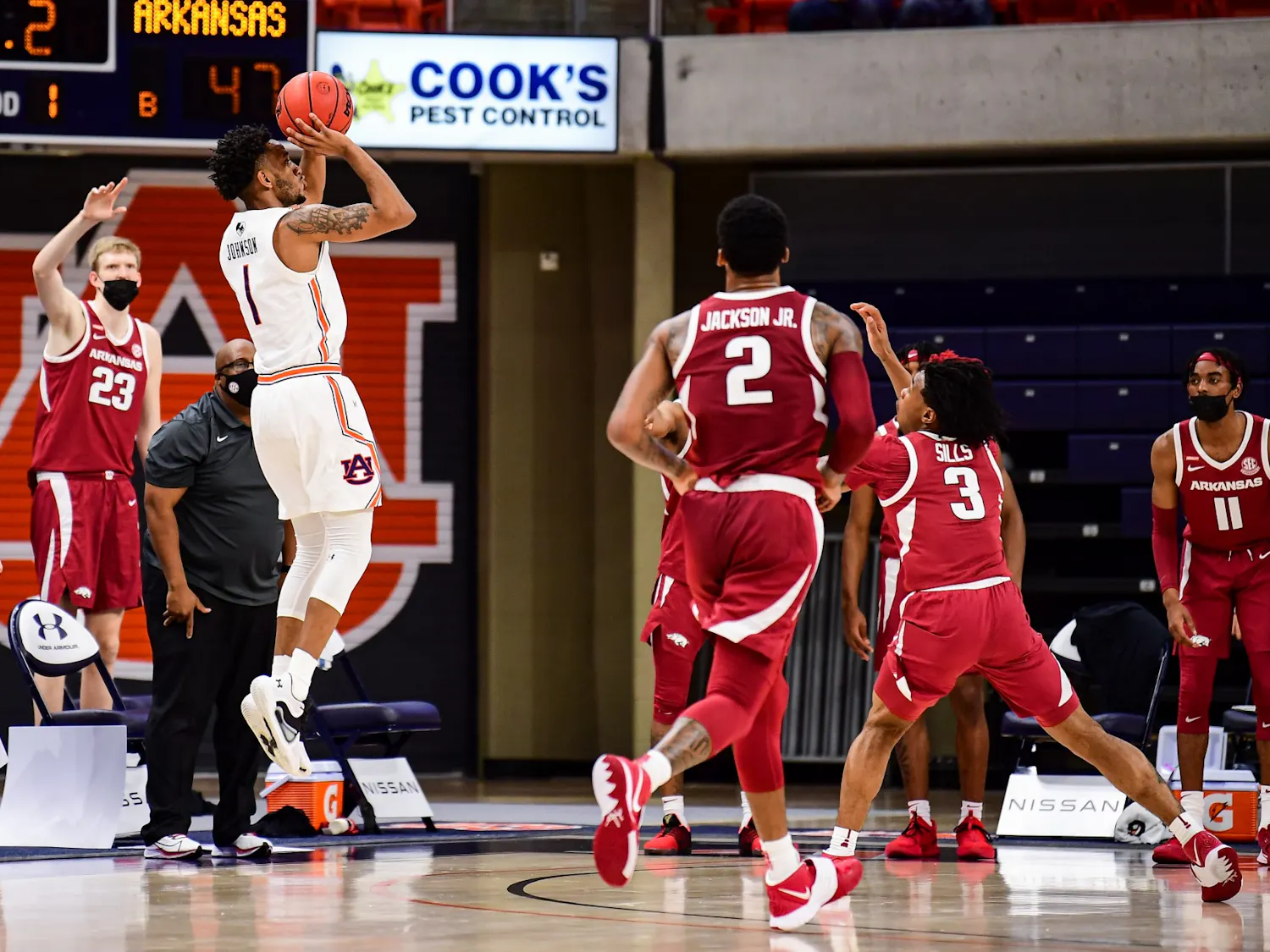 123020_Auburn_SL1_2719_Jamal Johnson shoots a three .jpg