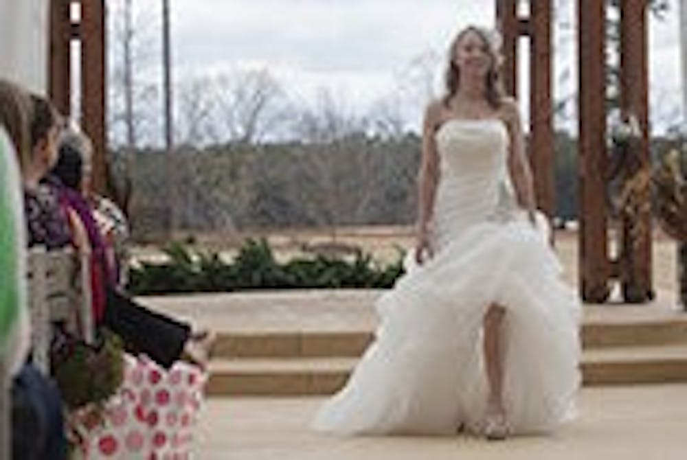 A bridal model shows off a dress at the 2014 Opelika-Auburn Bridal Expo. (Contributed by Opelika-Auburn News)
