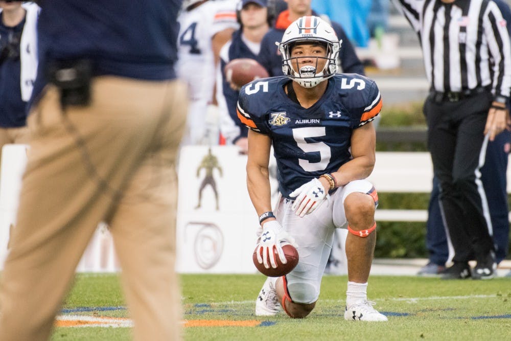 Devan Barrett (5) takes a knee after being knocked down&nbsp;during Auburn's A-Day game on Saturday, April 7, 2018, in Auburn, Ala.