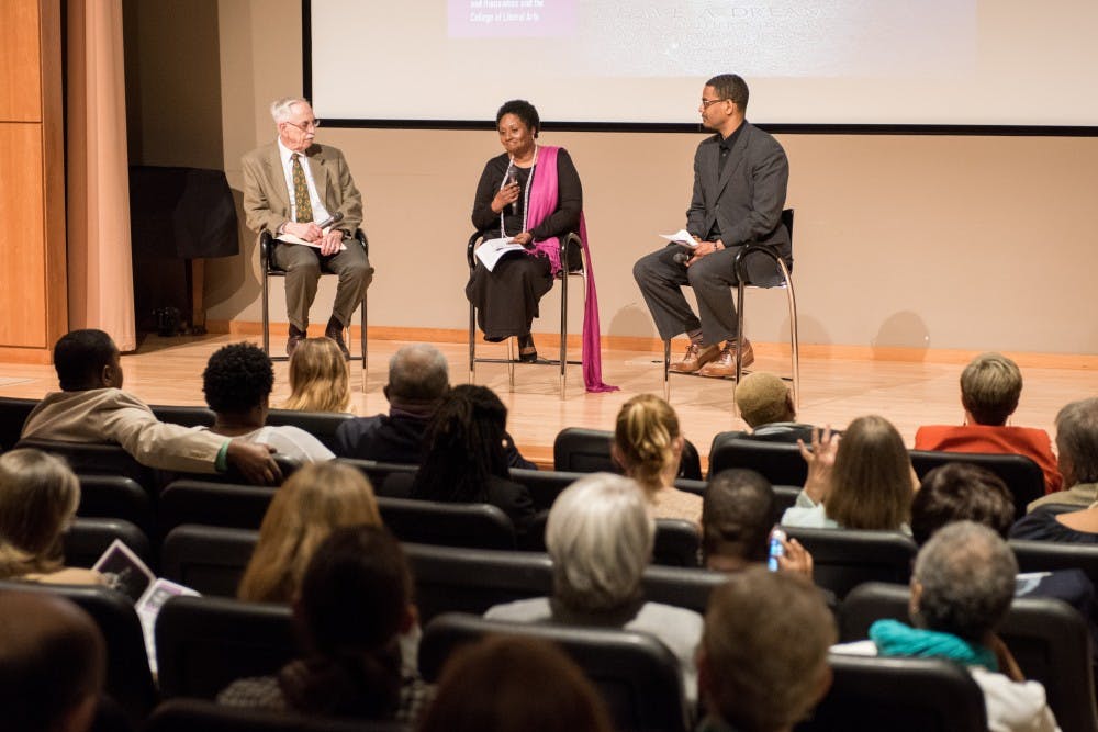 <p>Dr. Wayne Flint, Joan Harrell, and Rev. Dr. Otis Moss speak at the Becoming the Beloved Community event at the Jule Collins Smith Museum of Fine Art in Auburn, Ala., on Thursday, April 5, 2018.</p>