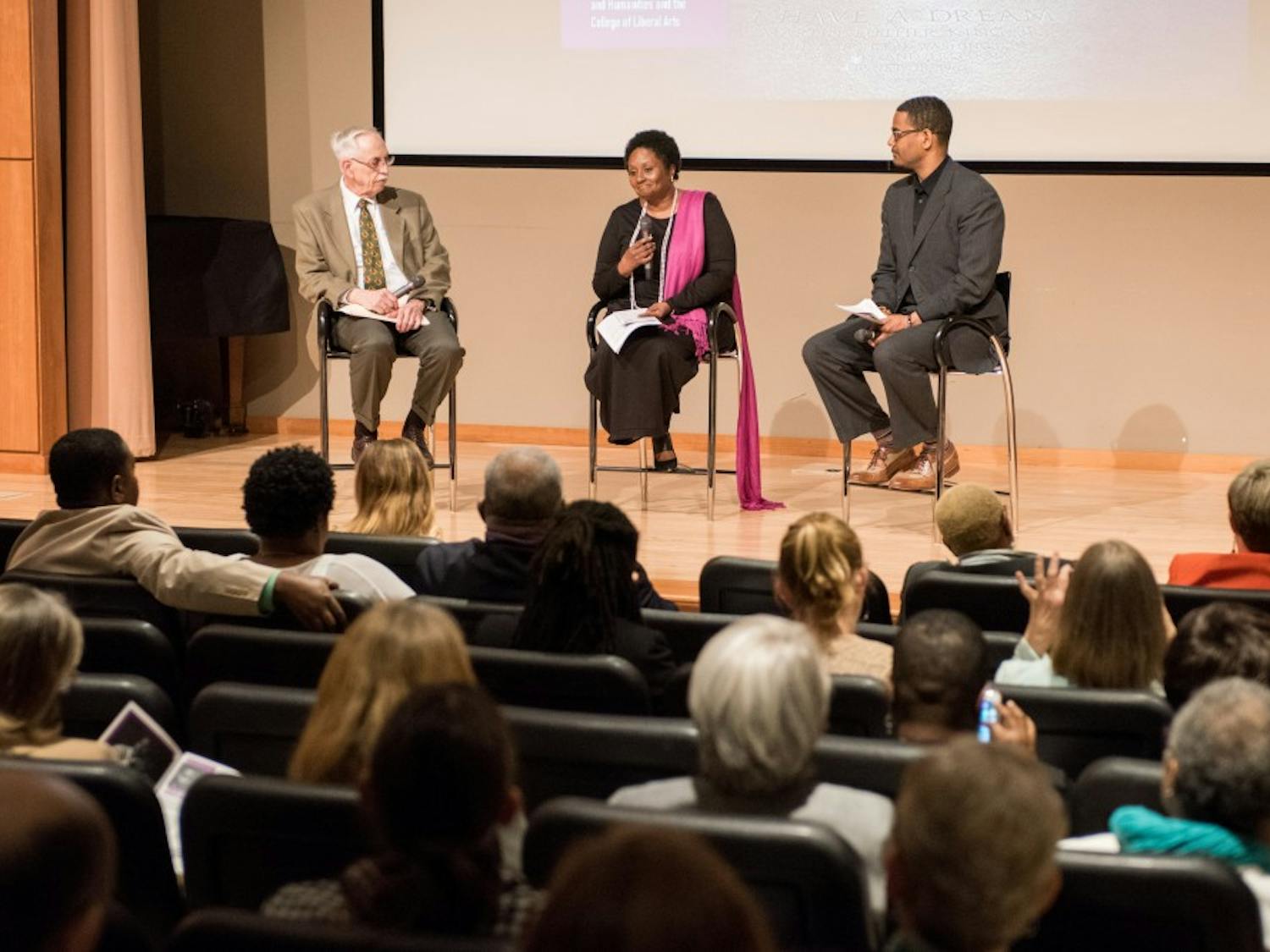 Dr. Wayne Flint, Joan Harrell, and Rev. Dr. Otis Moss speak at the Becoming the Beloved Community event at the Jule Collins Smith Museum of Fine Art in Auburn, Ala., on Thursday, April 5, 2018.