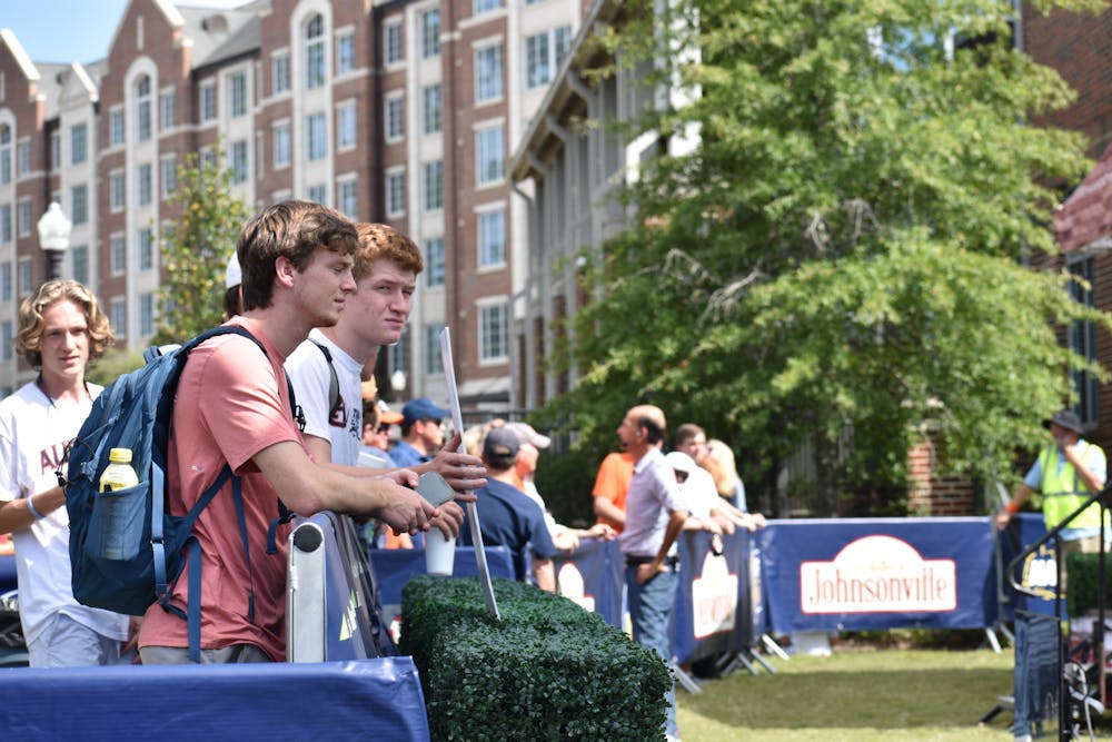 Fans gather behind the set of SEC Nation in Auburn on Friday.