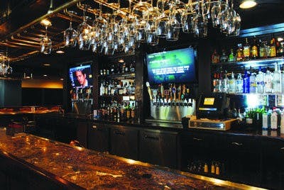 Manager Scott Warren said he would eventually like to reopen the bar in the back of the restaurant. (Maria Iampietro / Associate Photo Editor)