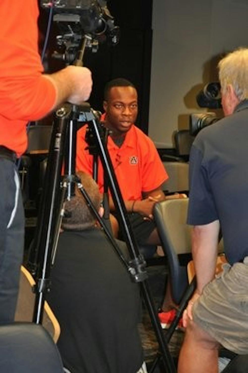 Senior defensive end Nosa Eguae answers questions during press conference. Anna Grafton / ASSISTANT PHOTO EDITOR
