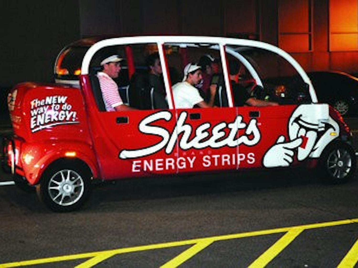 One of the Gotcha Cars takes a car load of people to their next destination. (Christen Harned/ASSISTANT PHOTO EDITOR)