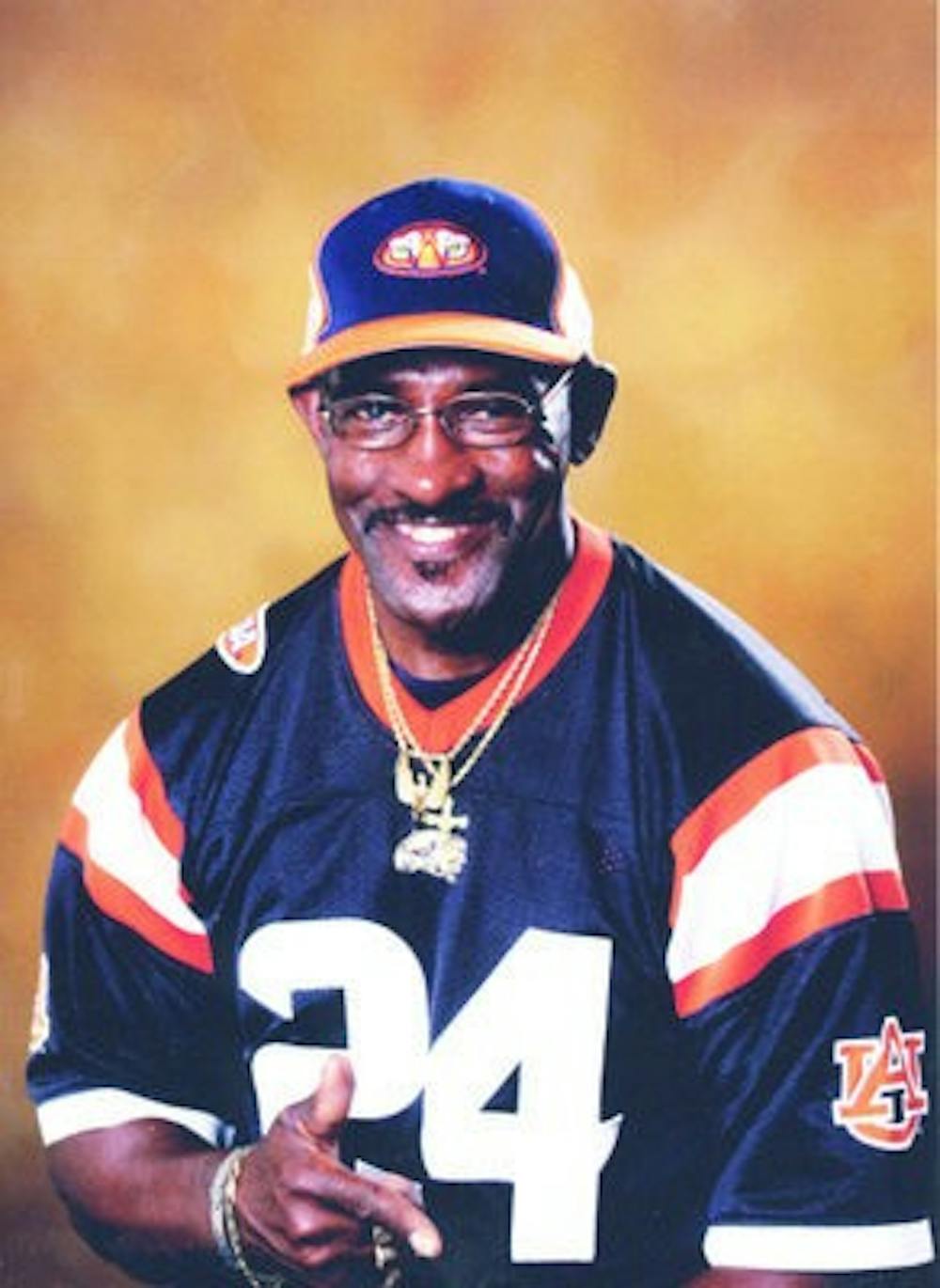 Lifelong Auburn resident Johnny Richmond, also known as Mr. Penny, does 25 push-ups every time Auburn scores. (Contributed)