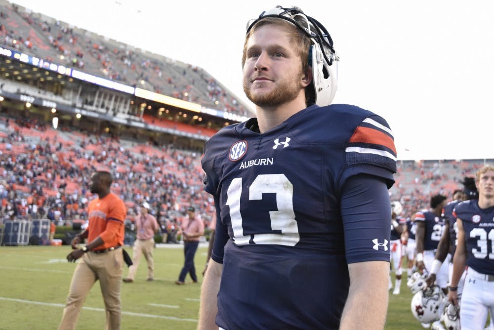 Sean White (13) walks off the field after Auburn's 58 to 7 victory over ULM, Saturday, Oct. 1, 2016, in Auburn, Ala.