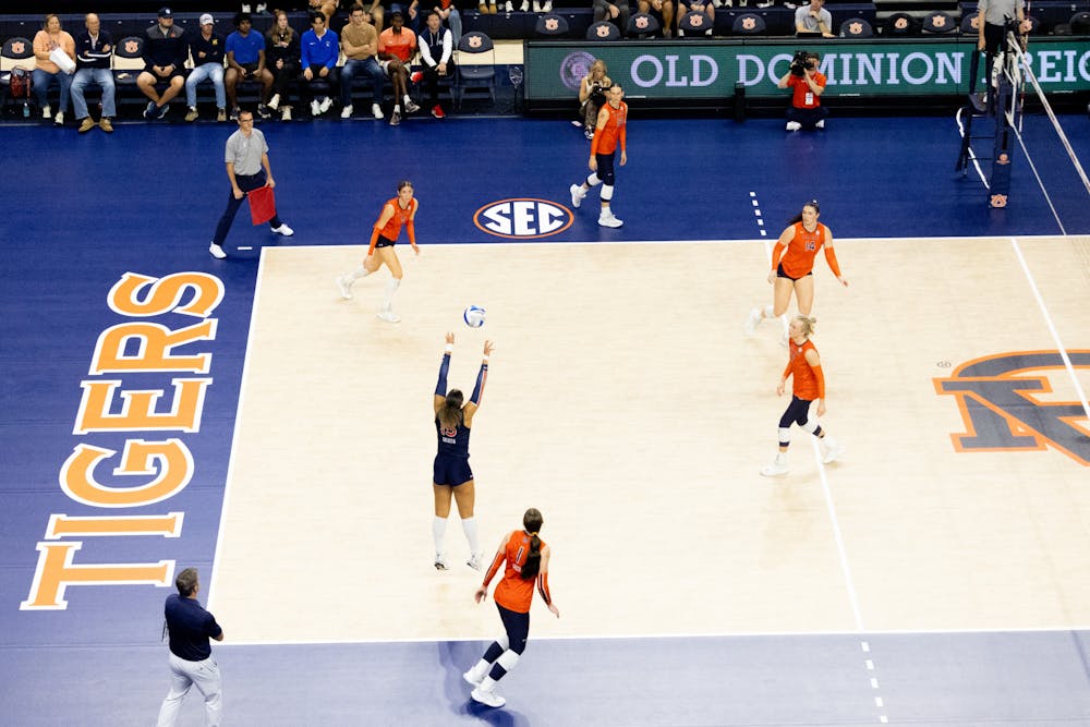 Auburn Women's Volleyball prepares for a play lead by Alexis Dacosta (15) setting the ball against Florida on Nov. 20, 2024 at Neville arena. 