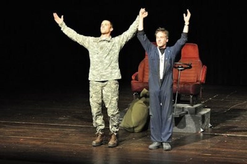 Eric Holzschuh and Kevin Bennett are applauded after their performance in "Six Dead Bodies" at Triple Crown Theater in New York. (CONTRIBUTED)