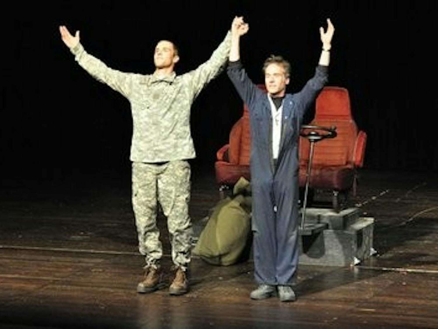 Eric Holzschuh and Kevin Bennett are applauded after their performance in "Six Dead Bodies" at Triple Crown Theater in New York. (CONTRIBUTED)