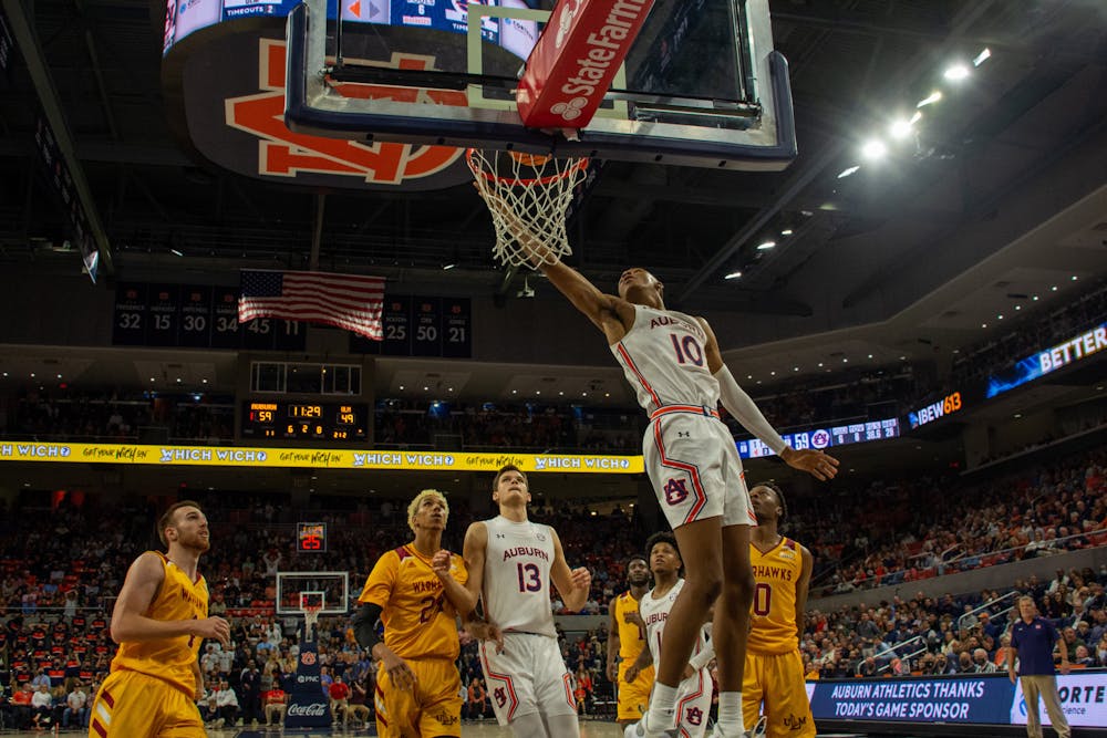 <p>Nov. 12, 2021; Jabari Smith (10) lays the ball in during a game against Louisiana Monroe from the Auburn Arena in Auburn, Ala.</p>