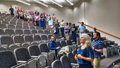 Robyn Ochs breaks students into groups representing points on the sexuality spectrum between gay and straight. (Kyle Nazario | Intrigue Editor)