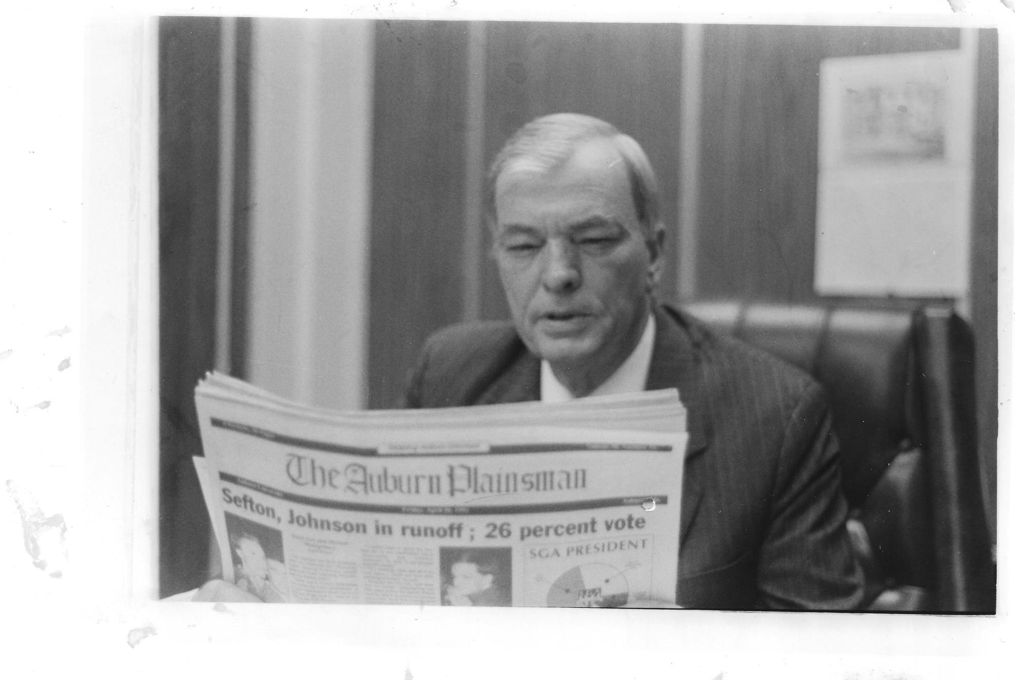 Faculty reads copy of The Plainsman from the 1960s to the 1980s. 