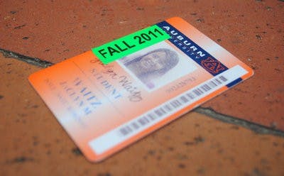 Students who pay the new $10 group fitness fee at the Student Act get stickers on their TigerCards. (Maria Iampietro / PHOTO EDITOR)