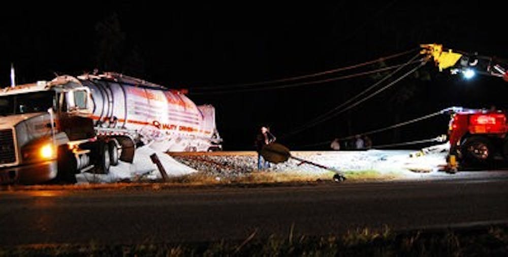 A second tow truck was called on the scene to assist the initial truck. (Brian Woodham / ASSOCIATE COPY EDITOR)