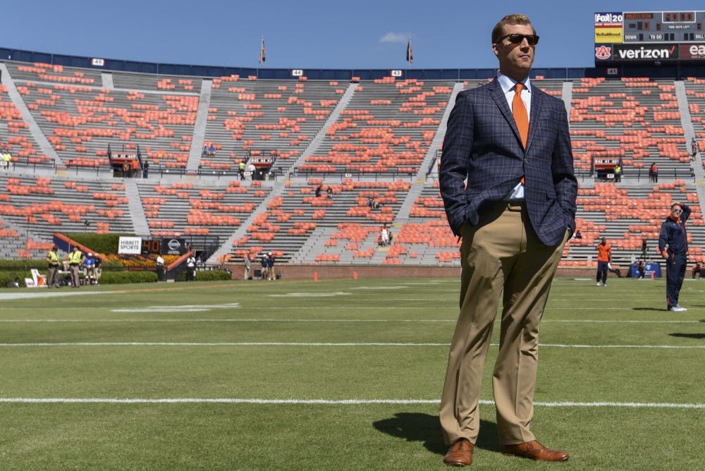 Rhett Lashlee stand on field prior to a NCAA college football game, Saturday, Oct. 1, 2016, in Auburn, Ala.