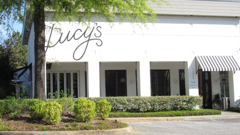 With a white brick exterior, on-comers can spot Lucy's from down the road.&nbsp;