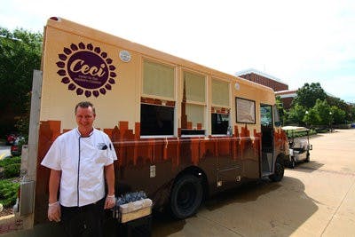 Chef Emil Topel stands outside Ceci, the new food truck on campus. Ceci is the first on-campus outlet to offer Halal meat to Auburn students.