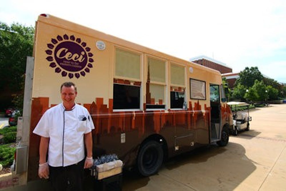 Chef Emil Topel stands outside Ceci, the new food truck on campus. Ceci is the first on-campus outlet to offer Halal meat to Auburn students. (Kenny Moss | Photographer)