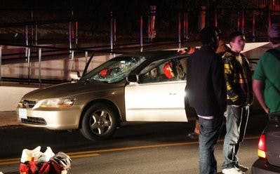 The 21-year-old female driver of a gold Honda Accord was attended to by Auburn Fire Department. Blakeley Sisk/ PHOTO EDITOR