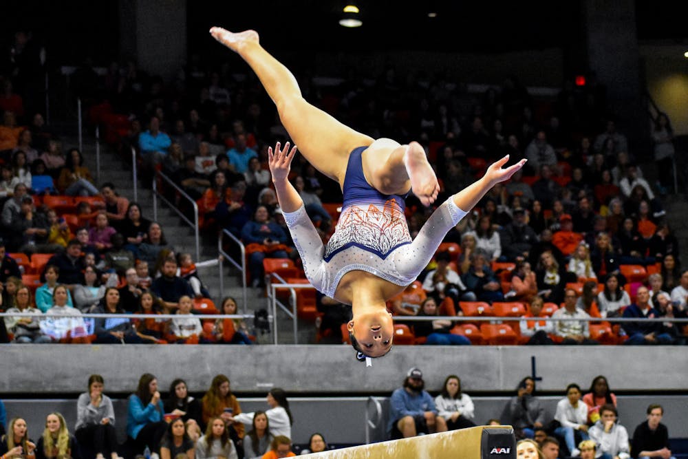 Olivia Hollingsworth competes on beam during a gymnastics meet between Auburn and Kentucky in Neville Arena on Feb. 25.