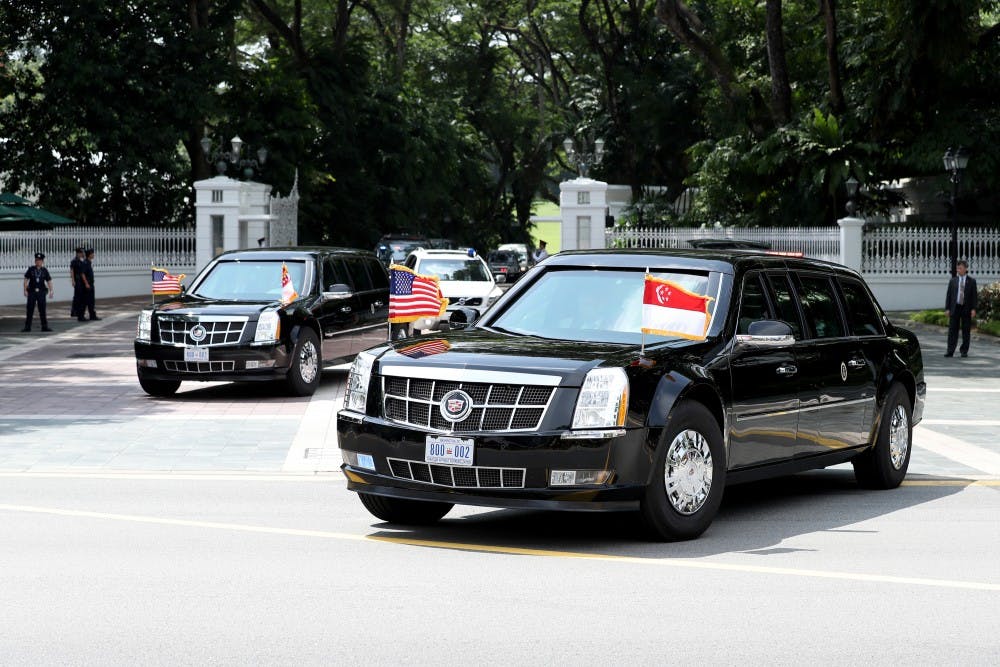 A motorcade transporting U.S. President Donald Trump departs The Istana following a meeting with Singapore Prime Minister Lee Hsien Loong on Monday, June 11, 2018. Trump and North Korea's Kim Jong-un, are expected to discuss the denuclearization of the Korean peninsula and lifting of economic sanctions currently imposed on the nation in tomorrow's summit. (Paul Miller/Zuma Press/TNS)