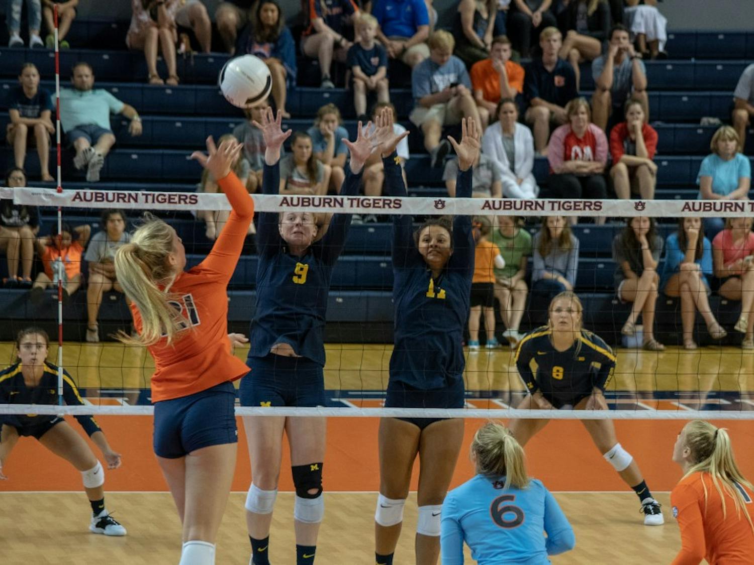 Tatum Shipes (21) jumps to hit the ball during Auburn Volleyball vs. Michigan on Saturday, Aug. 25, 2018, in Auburn, Ala.
