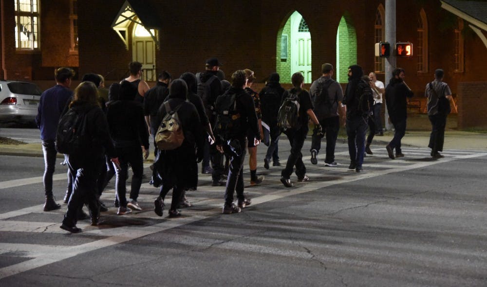 Protesters leave the Richard Spencer event on April 18, 2017 in Auburn, Ala.