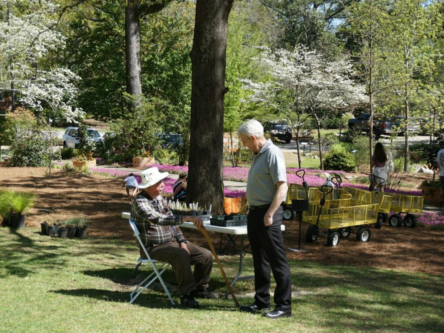 Members of the community talk during the Azalea Festival&nbsp;at Auburn University's Donald E. Davis Arboretum on Saturday, March 31, 2018, in Auburn, Ala.