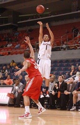 Sophomore guard Andre Malone takes a shot during Monday night's exhibition game against Columbus State. (Emily Adams / photo editor)
