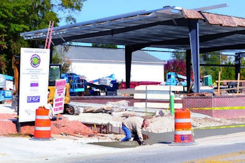 Downtown construction will culminate in two new restaurants this winter: Tropical Smoothie (above) on West Glenn Avenue and Chipotle Mexican Grill on West Magnolia Avenue. (Christen Harned / ASSISTANT PHOTO EDITOR)