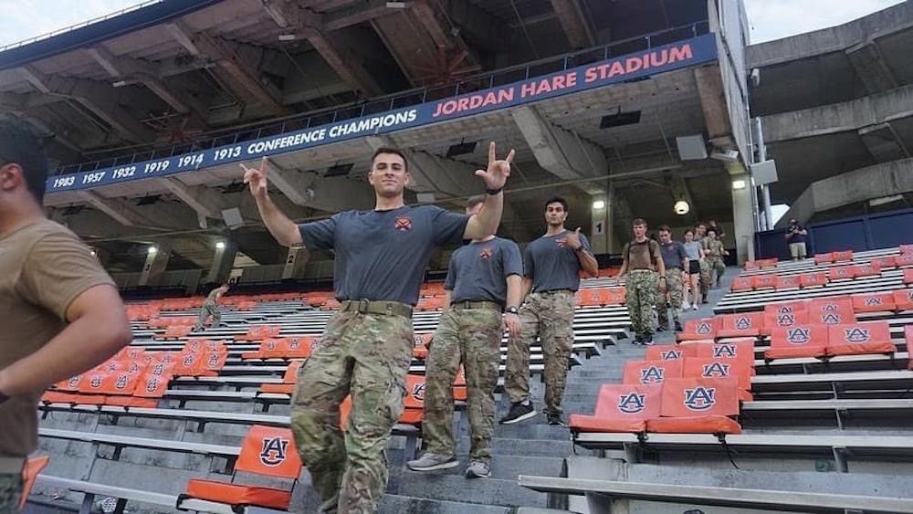 <p>Members of Auburn University's ROTC participate in 2022's 9/11 memorial stair climb.</p>