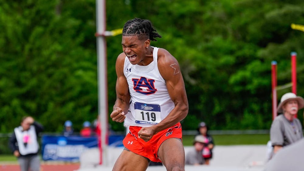 <p>Dontavious Hill celebrates after qualifying for his first outdoor NCAA Championship, just the seventh Auburn athlete to qualify for a trip to the outdoor Championship meet.</p>