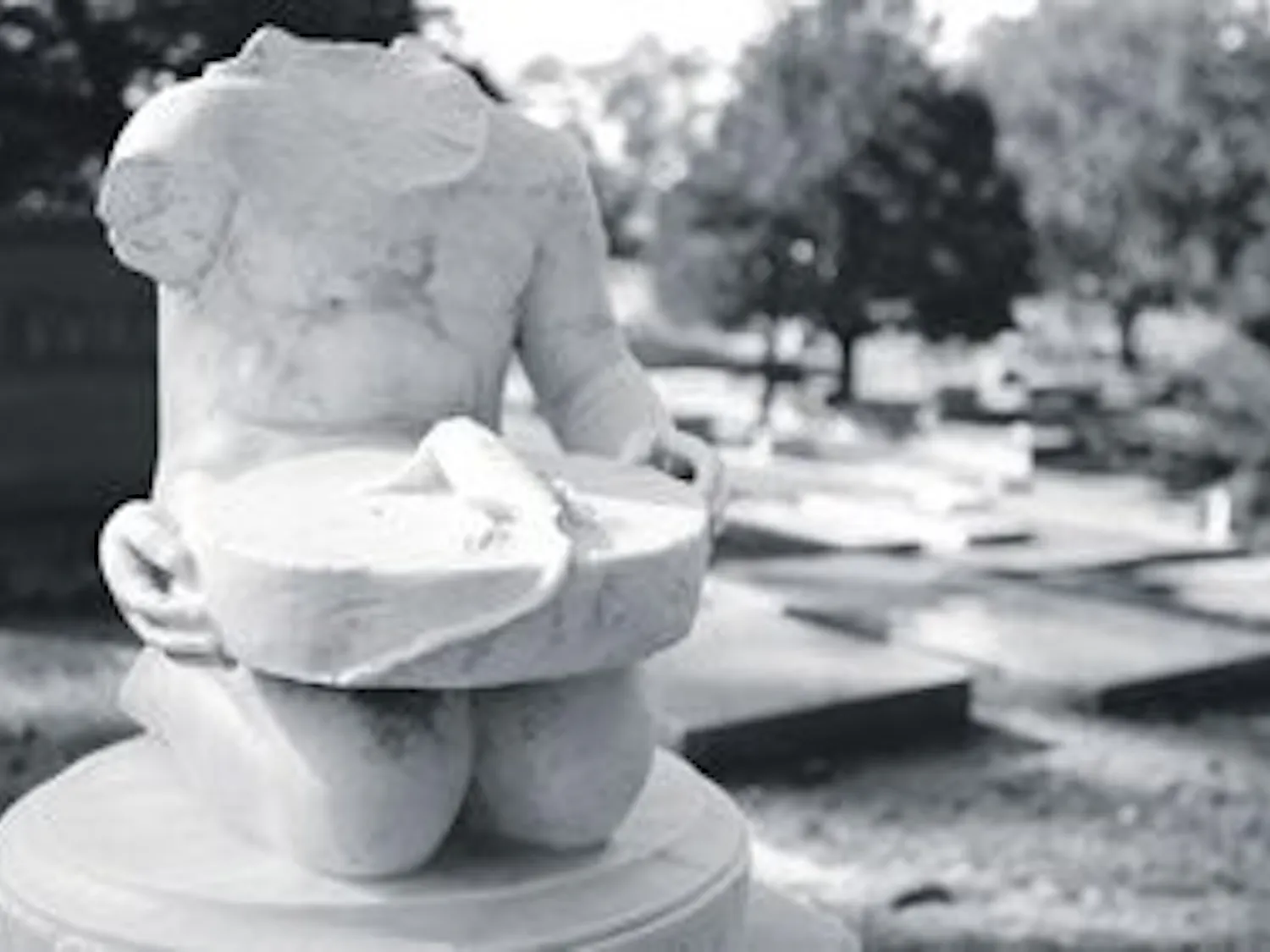 The headstone of Charles Stodghill Miles is alleged to be the most vandalized grave in Pine Hill Cemetery on Armstrong Street. Miles was only a child when he died of an allergic reaction to an insect bite. (Rebecca Croomes / PHOTO EDITOR)