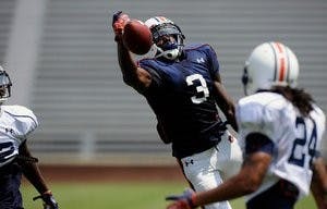 DeAngelo Benton is unable to stretch and make the catch during Auburn's scrimmage on August 18. Auburn will face Clemson without him due to a suspension for an undisclosed rule violation. (Courtesy of Todd Van Emst)