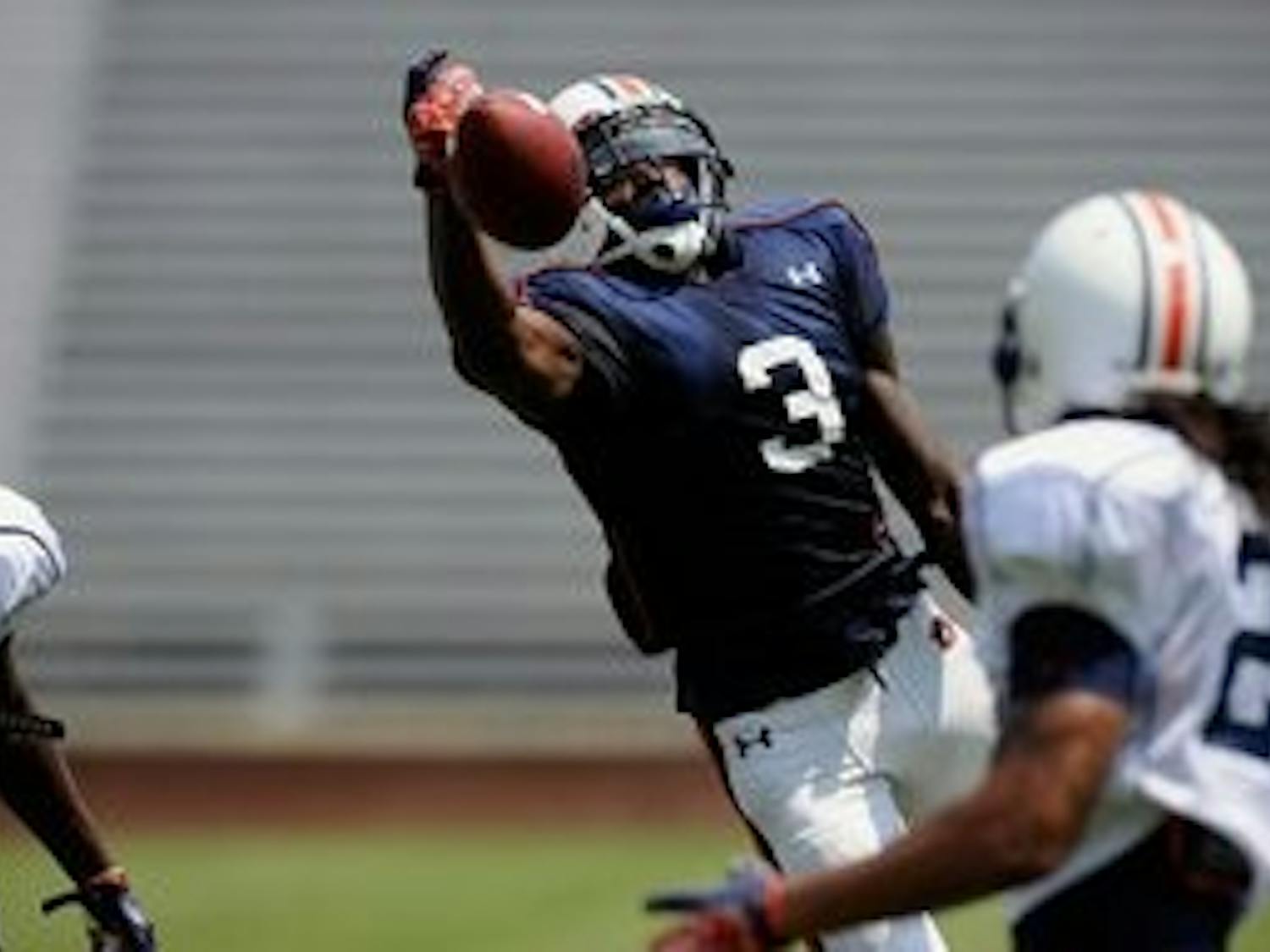 DeAngelo Benton is unable to stretch and make the catch during Auburn's scrimmage on August 18. Auburn will face Clemson without him due to a suspension for an undisclosed rule violation. (Courtesy of Todd Van Emst)