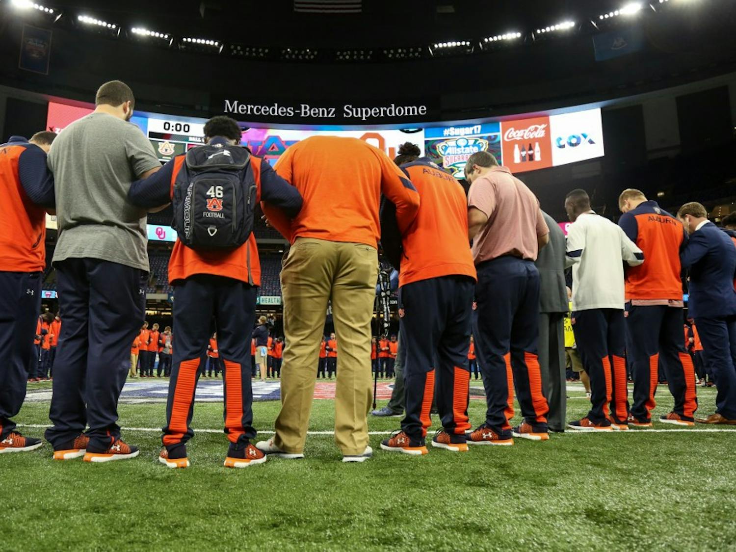 Auburn players stand at mid-field prior to the start of the Allstate Sugar Bowl, Monday, Jan. 2, 2017, in New Orleans, LA.