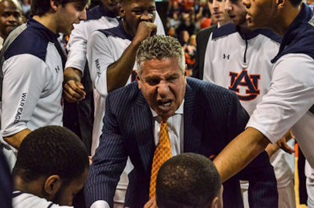 Bruce Pearl talks to his team against Milwaukee. (Raye May / Photo Editor)