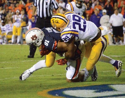 C.J. Uzomah crossing the endzone right before his touchdown tribute dance to Lutzie.