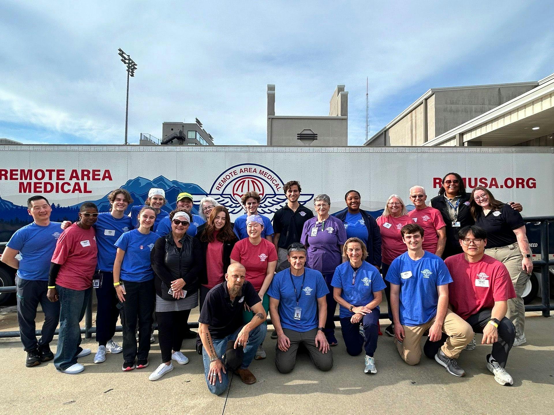Volunteers gathered at the entranced of the free healthcare clinic in Montgomery, excited to get to work.