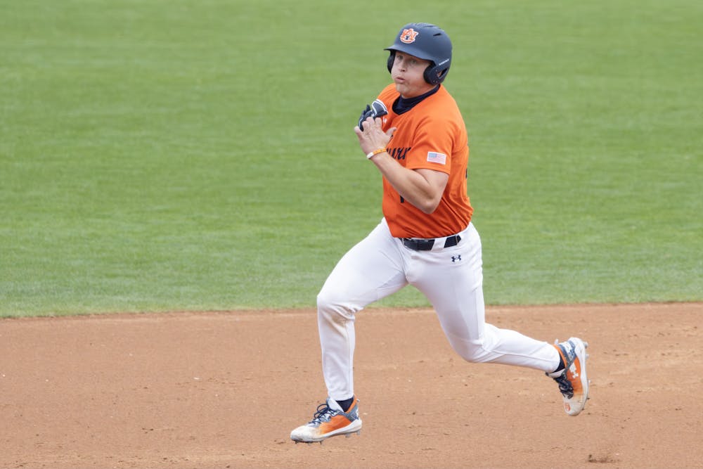 <p>Catcher Ike Irish (#18) runs hard through second base versus Wright State in Plainsman Park on February 23rd, 2025.</p>