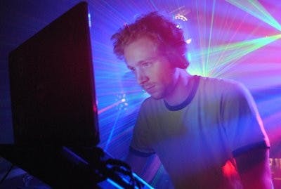 DJ Icky Bob picks individual songs for listeners to enjoy on their headphones at the silent disco. (Maria Iampietro / PHOTO EDITOR)