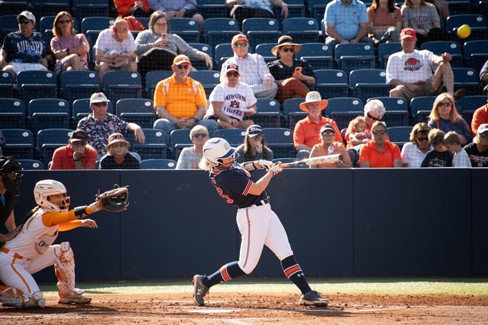 <p>KK McCrary (16) hitting the first home run for the Auburn Tigers during their second softball match against the Tennessee Lady Vols, March 30, 2024.</p>