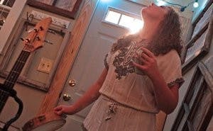 Bethany Whitehead sings harmony and plays tambourine in Adventure the Great. (Rebecca Croomes / PHOTO EDITOR)