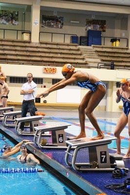 Recently named SEC and National Swimmer of the Week, Arianna Vanderpool-Wallace, senior in hotel and restaurant management, prepares Friday morning for a meet. (Danielle Lowe / ASSISTANT PHOTO EDITOR)