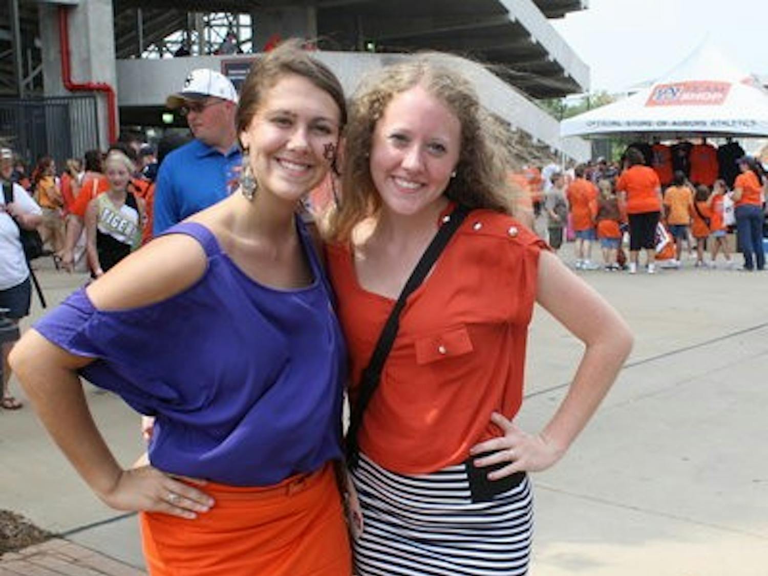 With bright tops tucked into their simple skirts, Shelby Baker and Tessa Harvill, both freshmen in pre-nursing, integrated the trend into their gameday apparel.