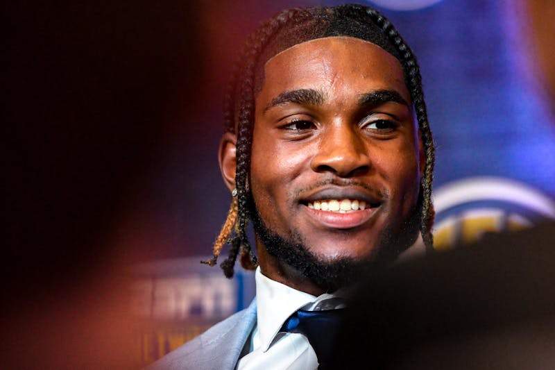 July 21, 2022; Atlanta, Georgia, USA; Auburn junior running back Tank Bigsby smiles while recalling the story of how he received his nickname from his mother as he speaks to a crowd of reporters during SEC Media Day at the College Football Hall of Fame.