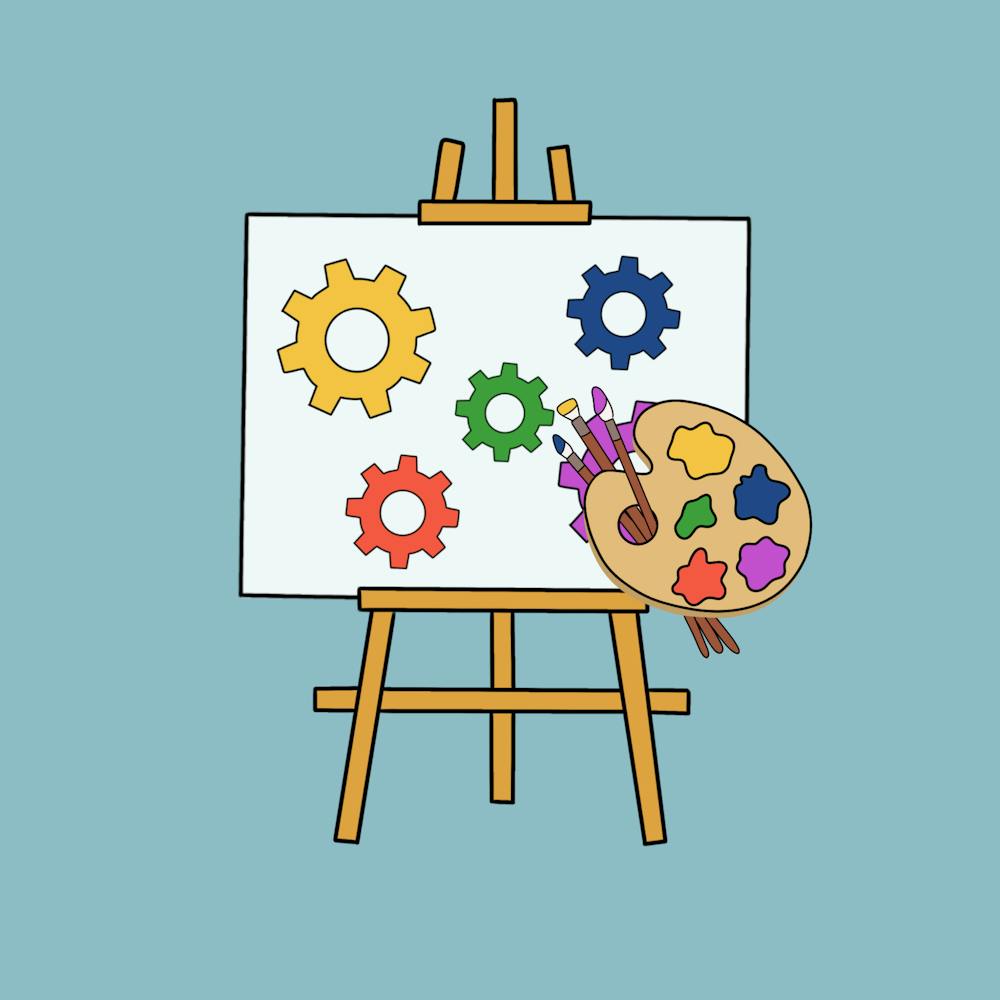 An easel with a palette of paint and different colored gears painted.