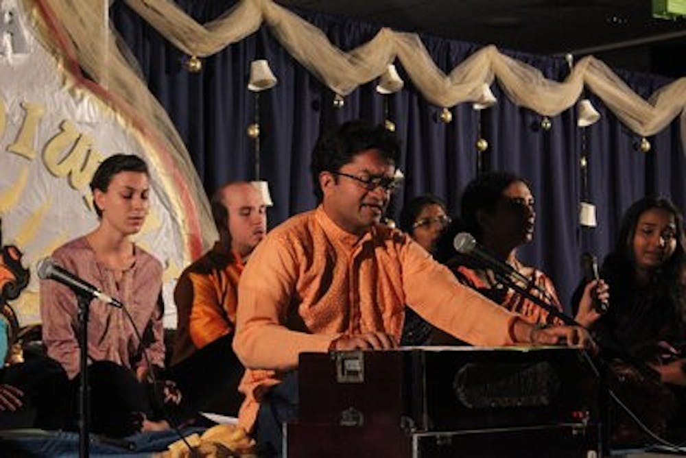 Shiladitya Raj Chaudhury, associate director of the Biggio Center, plays traditional Indian music at the celebration.