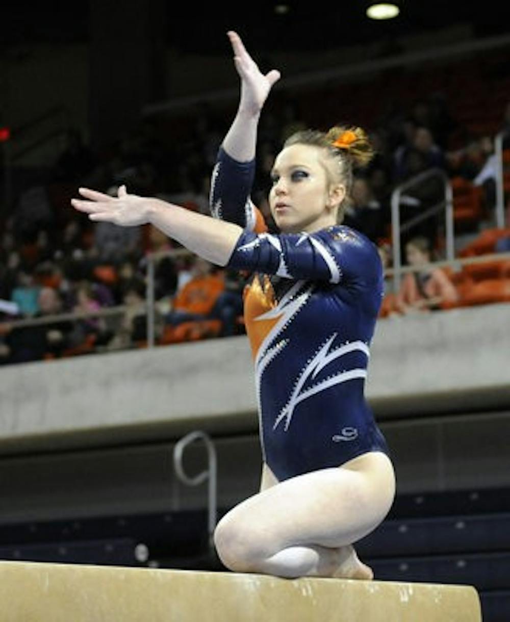 Auburn's Caitlin Atkinson competing on the beam against LSU Friday, Feb. 22. (Courtesy of Todd Van Emst)